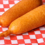 Corn-Dogs-on-Red-Paper-iStock